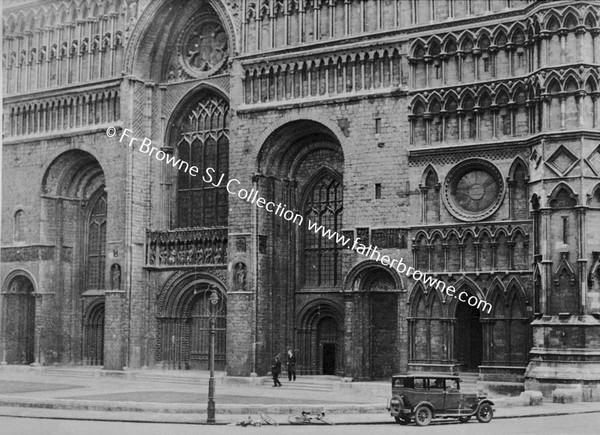 THE WEST FACADE SHOWING NORMAN WALL OF ORIGINAL CHURCH ENCASED IN GOTHIC